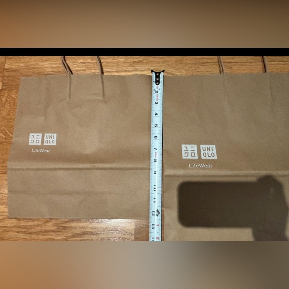 Set of 2- Uniqlo paper shopping bags.